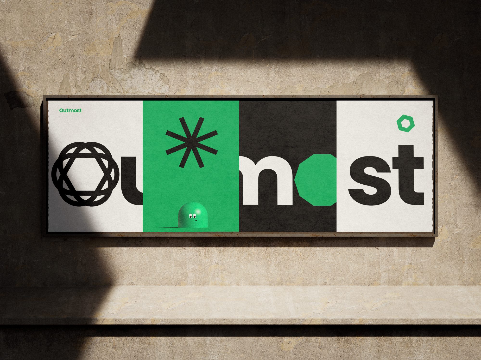An Outmost poster on a sunlit concrete wall
